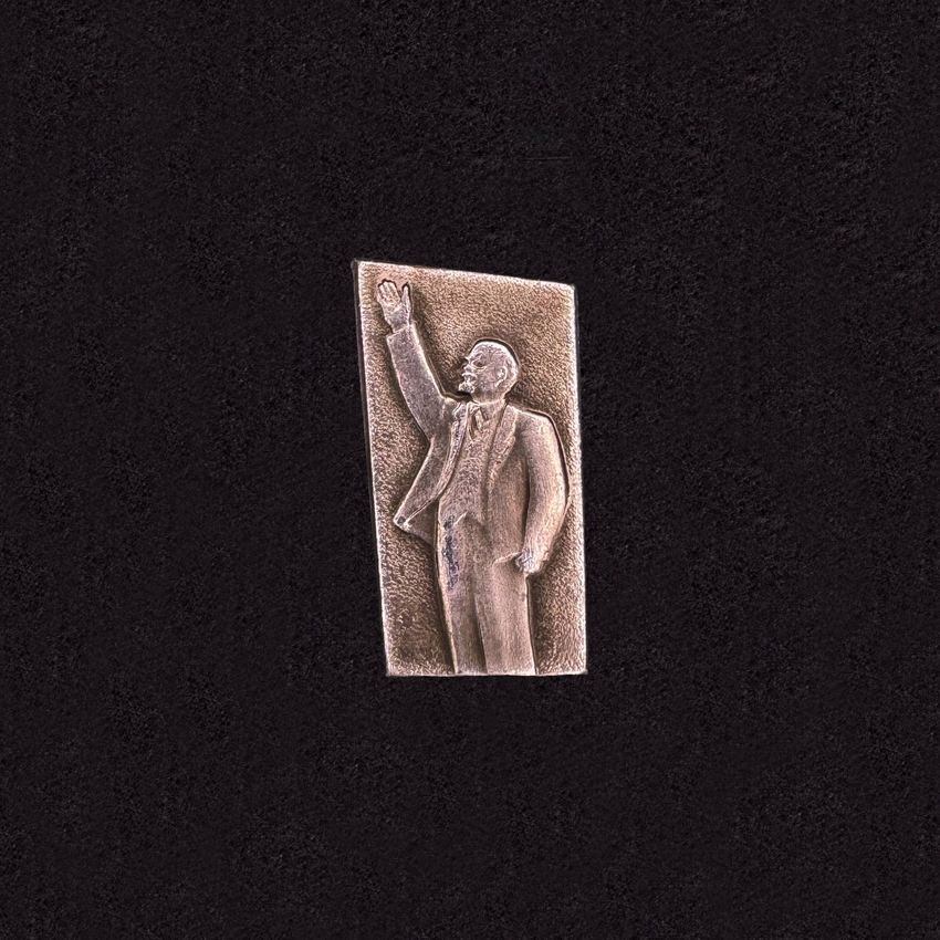 Lenin. Hand raised up